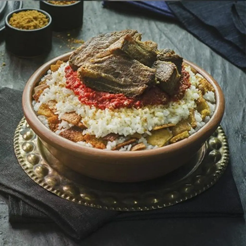 طاجن لحم ضاني مع الأرز والخضار